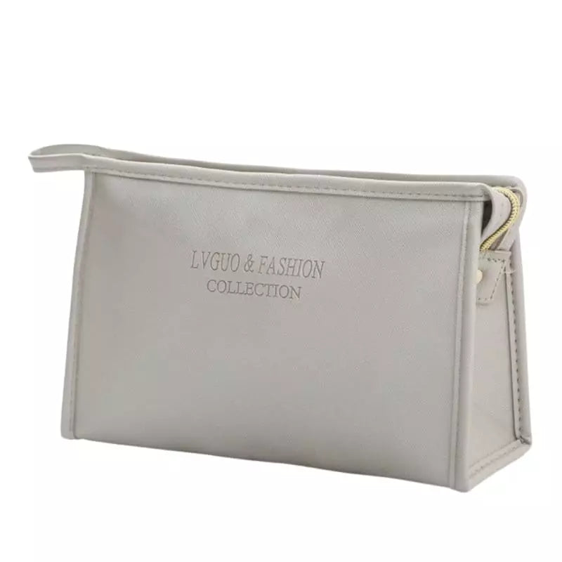 trousse-de-toilette-cuir-femme-gris-a-vos-trousses Trousse de toilette cuir femme gris - À vos trousses