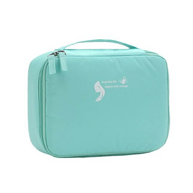 trousse-de-toilette-femme-avec-plusieurs-compartiments-vert-a-vos-trousses Trousse de toilette femme avec plusieurs compartiments vert - À vos trousses