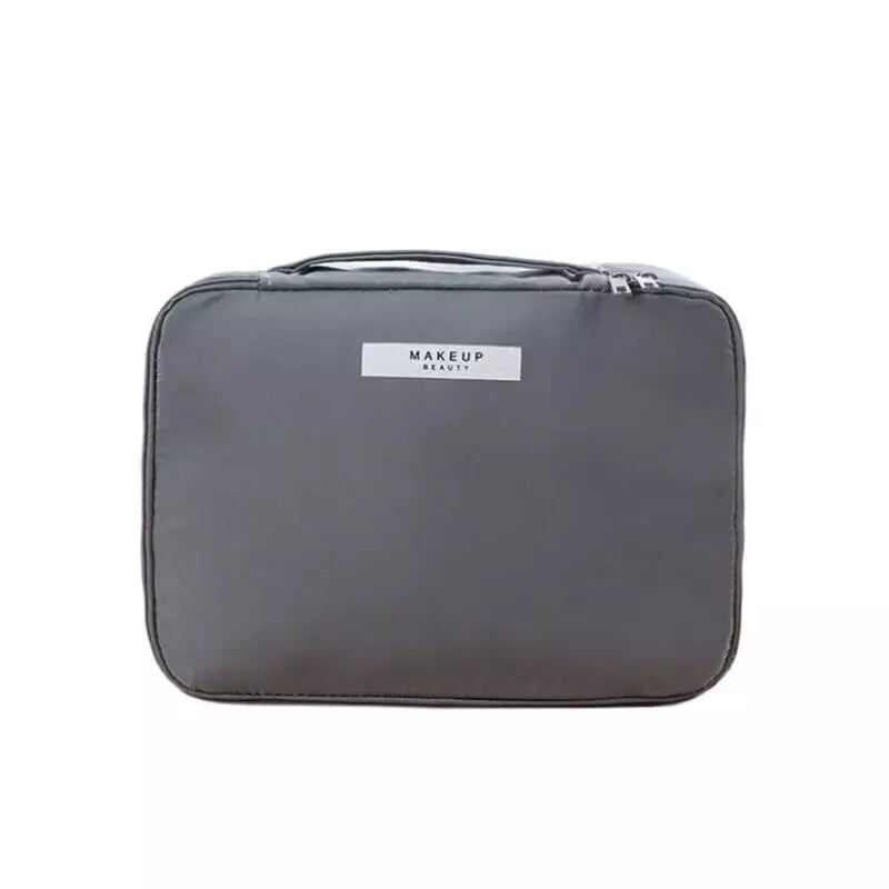 trousse-de-toilette-femme-grand-format-gris-a-vos-trousses Trousse de toilette femme grand format gris - À vos trousses