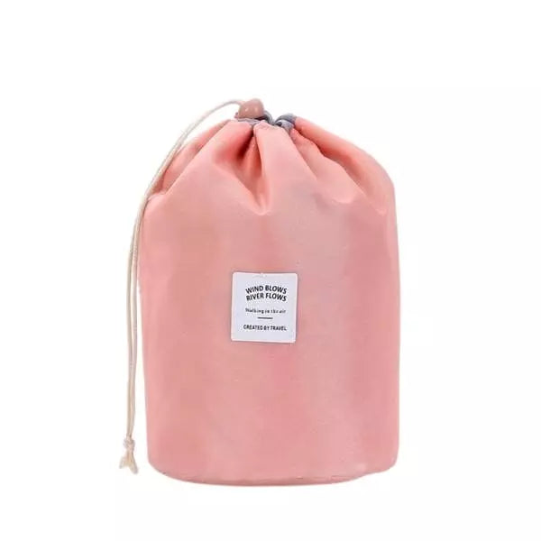 trousse-de-toilette-ronde-rose-a-vos-trousses Trousse de toilette ronde rose - À vos trousses