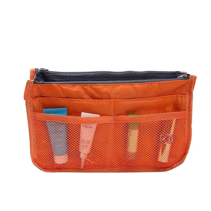 trousse-de-toilette-sac-orange-a-vos-trousses Trousse de toilette sac orange - À vos trousses